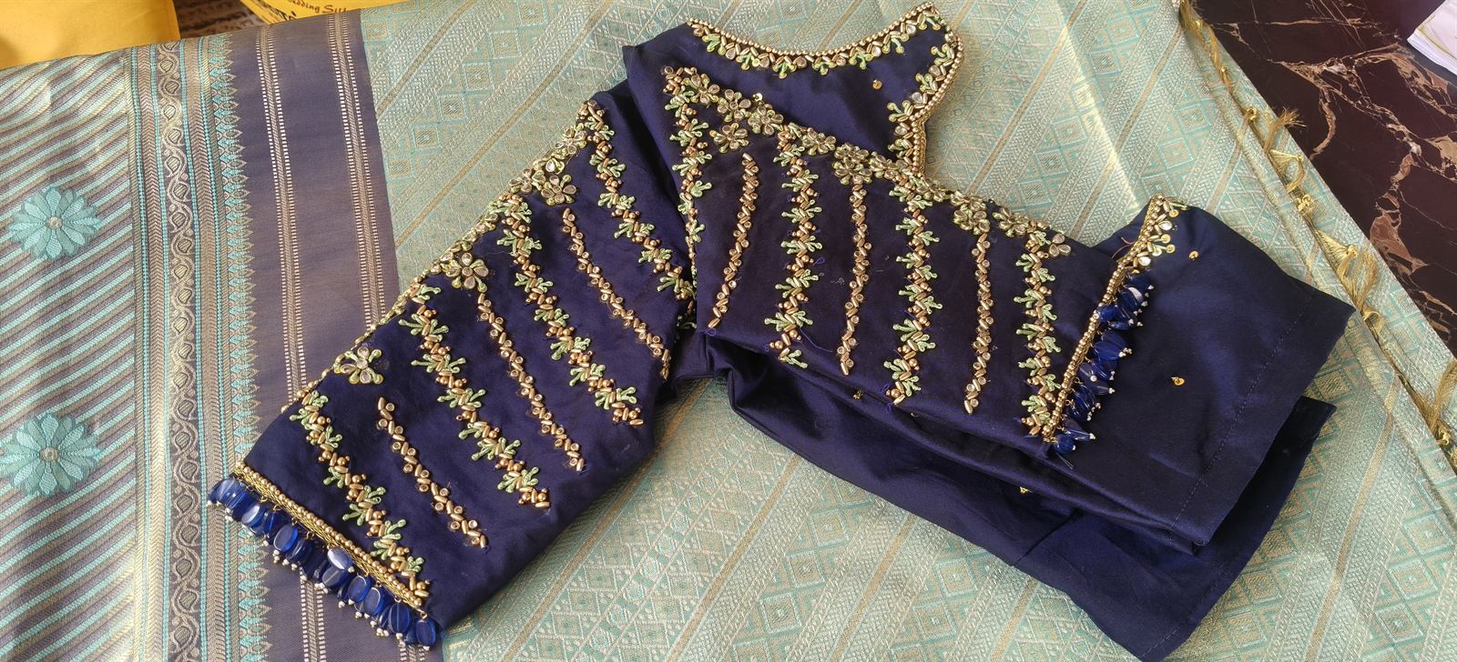 Statement Aari sleeves with bead fringe