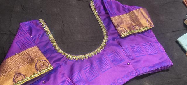 Purple pattu silk blouse with Aari border